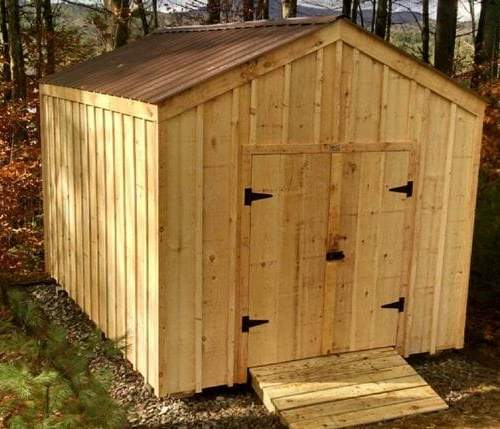 Upgrades shown on this New Yorker shed are pine battens and a tudor brown metal roof