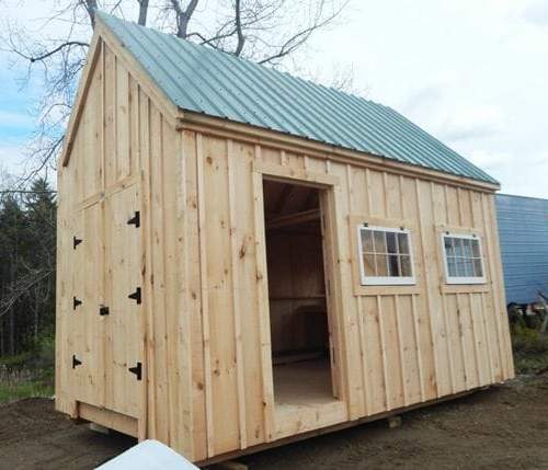 10x16 Hobby House - standard build with double doors, single door, windows, pine siding and green metal roof