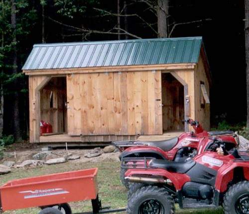 10x16 Three Sled Shed - Shown with sliding barn doors opened