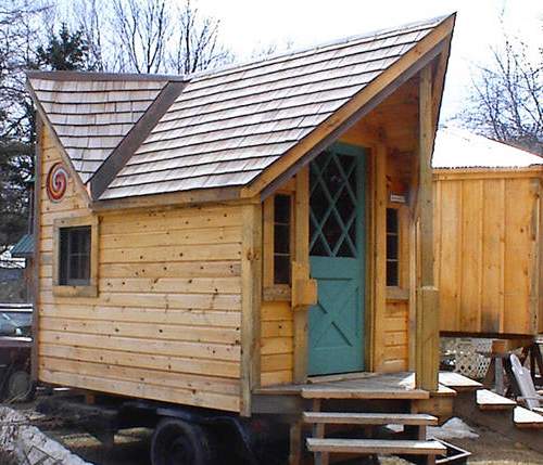 12x16 Backyard Retreat with Cedar Shingle Roof, Novelty Pine Siding, Antique Door and Extra Windows