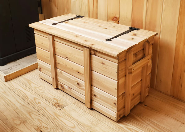 wood cedar chest with fliptop lid for storing wood pellets, blankets and linens, or games and toys