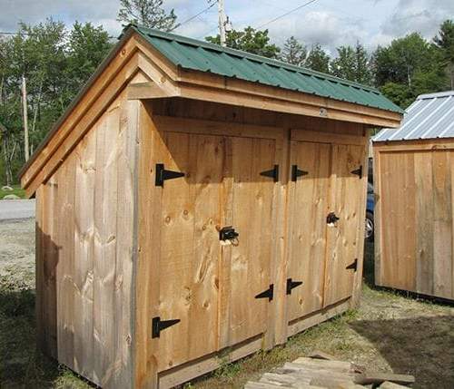 4x10 Garbage Shed with evergreen metal roof and double doors