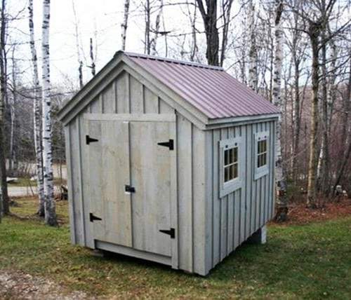 8x10 Gable with brown roof and gray painted sides. Includes a double door and two hinged windows