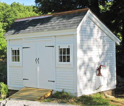 8x12 Church Street white storage shed with asphalt shingle roof