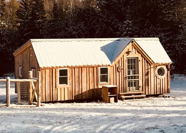 This small cabin will be cozy if a woodstove is installed inside.