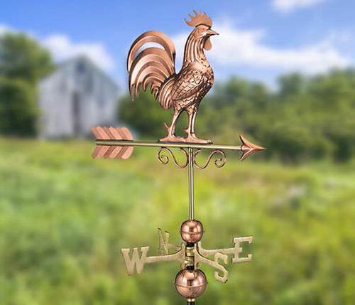 This decorative weathervane is made out of copper with brass directionals.